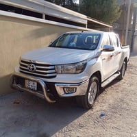 فلاونز هايلوكس 2016  رقم بغداد دولي انكليزي بسمي  فور ويل كامل المواصف...