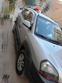 توسان 2009 بغداد بأسمي  كير .مكينة .تبريد تدفئة كفالة صبغ فقط قبغ جنطة...