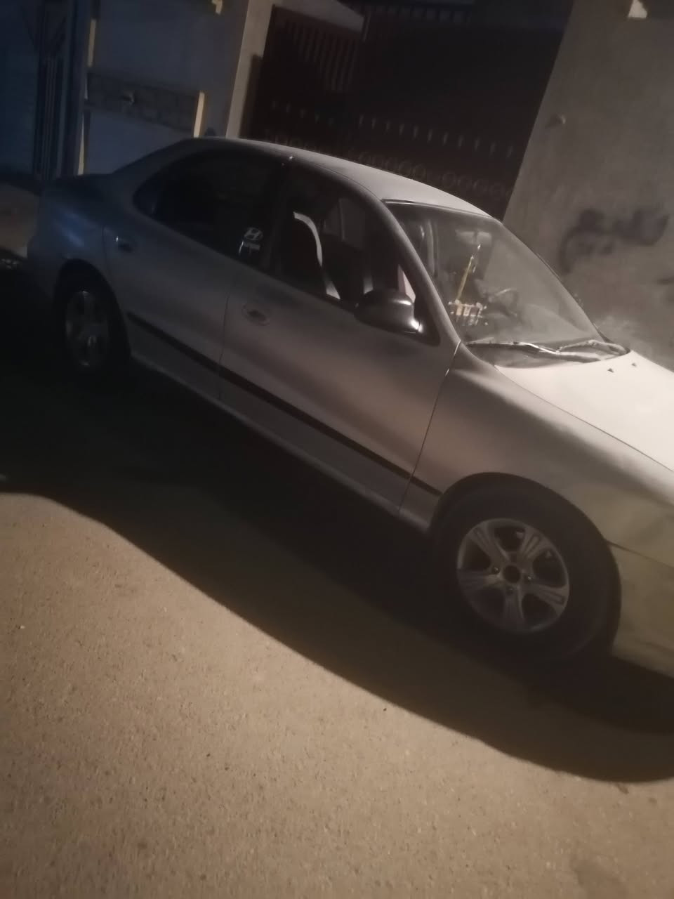 سلام عليكم انتره البيع موديل 99 السياره بلاديه شرط التحويل مباشر السياره جاهزه من كلش تخم تاير ويل كب لايت عالي وناصي جام جدبي محرك وكير مكفولات صدر جديد السياره  ناعمه بل شارع  رقم  ا لانبار داخل نظيف كشنات جديد مكان السياره الفلوجه حي الرساله بيع اومراوس السعر 29 وبيه مجال رقم الهاتف ***********وتساب بي

نص مكتوب في الصور:
- الثلاثاء