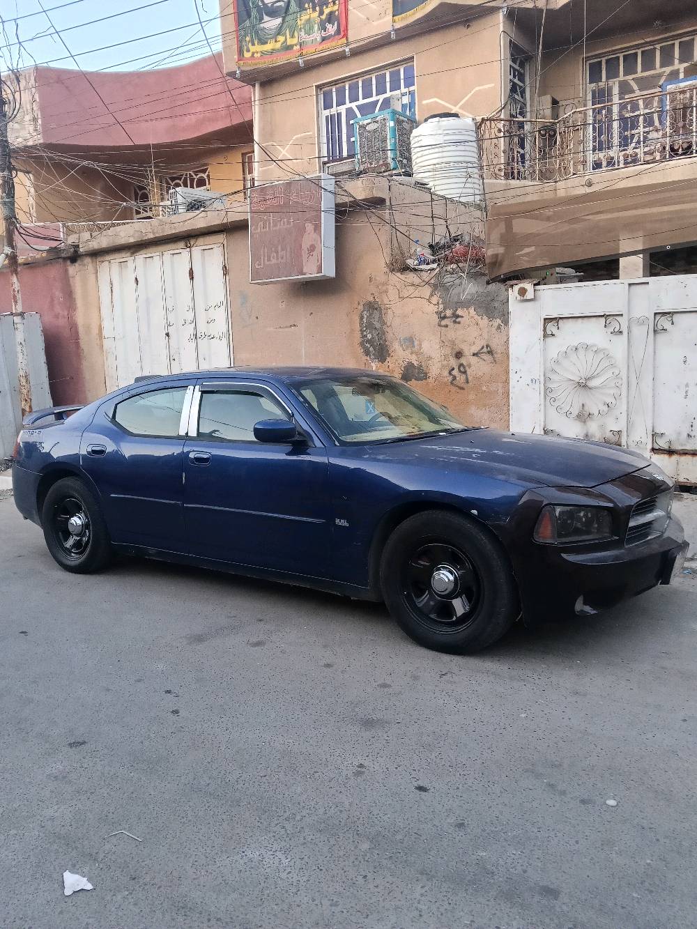 جارجر موديل2010 فول فتحه تحكمات ستيرن شاشه قلاب كشن جلد كهرباء وارد كندي جاملغ امامي وخلفي رقم بغداد سعر90