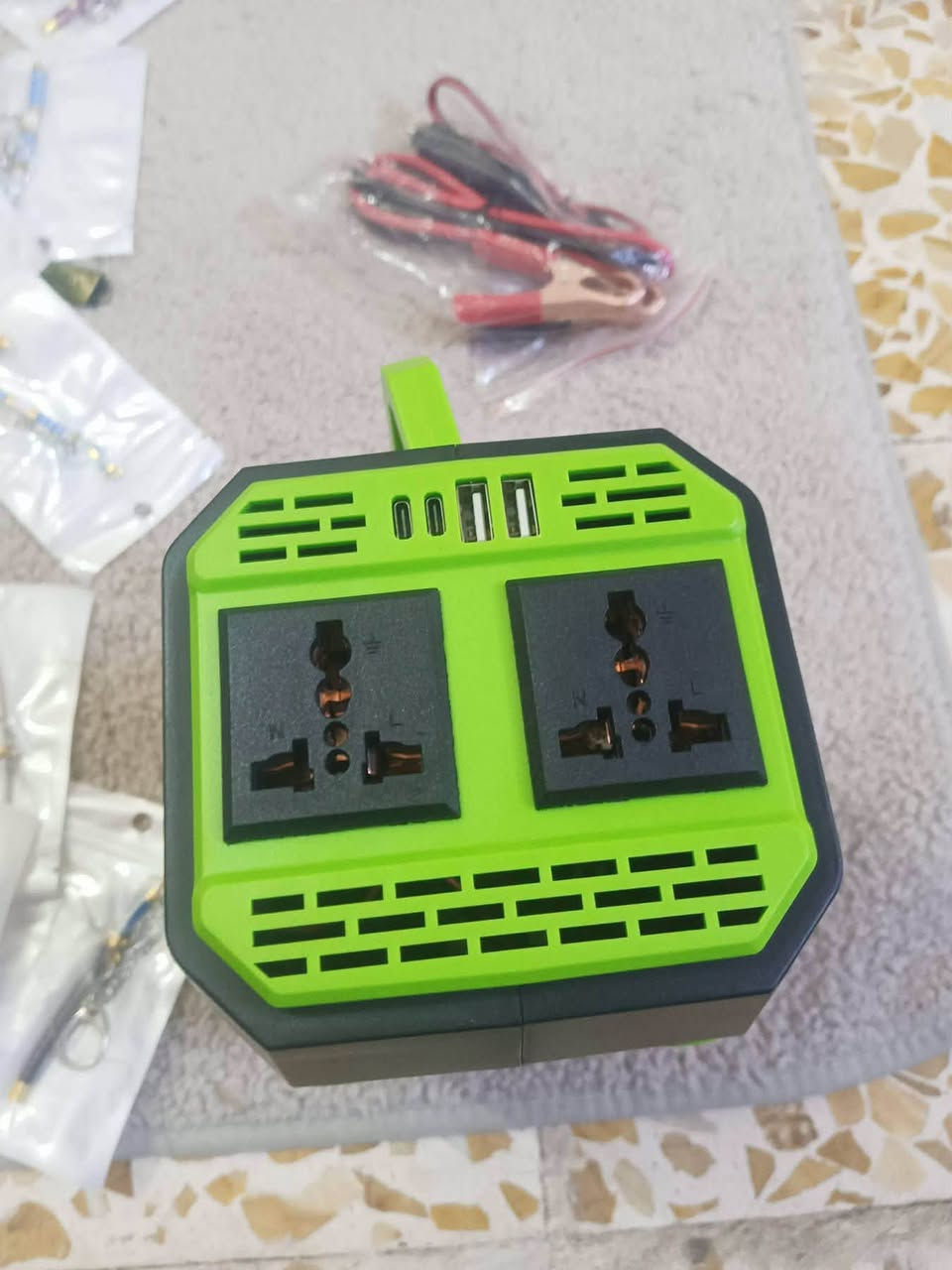 اعلى سعر

نص مكتوب في الصور:
- OUTDOOR EMERGENCY POWER SUPPLY 8 machine work together Switch (15W) Laptop (60W) Phone (11W) Camera (15W) Go Pro (15W) Drone (25W) DC Fan(50W) Lamp (5W)
- ACCESSORY STORAGE ROOM Push and Open Open it! Put the accessory into the storage room for easy carrying 12V Battery
- with Universal Socket Power Inverter DC 12V to AC 220V/110V 300W/500W 2x Battery Clip 1x Car Plug