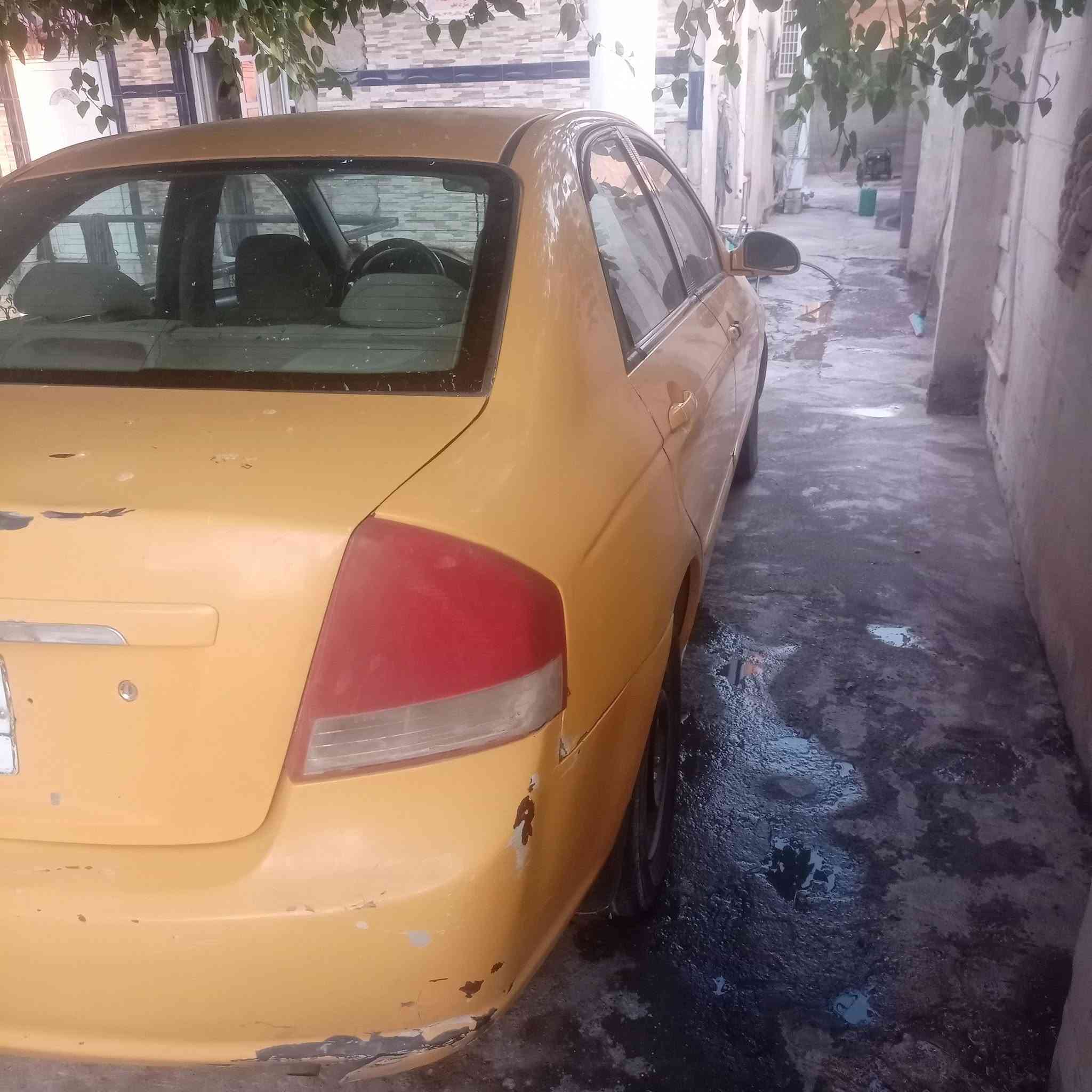 سبكترا ٢٠٠٩للبيع سياره شغاله نقص بس الصدر تعبان للاستفسار الاتصال ***********السعر٧٠وبيها مجال بصيط
