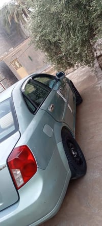 اوبترا موديل 2008 رقم بغداد انكليزي للبيع او لمراوس العنوان بغداد  077...