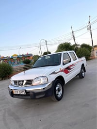 نيسان ٢٠٠٦ • أحمر • تكييف شغال