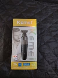 مكينة حلاقه شركة kemei السعر 15 الف التوصيل جميع محافضات العراق للاستف...