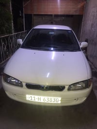 بروتون • ٢٠٠٤ • كير اوتو