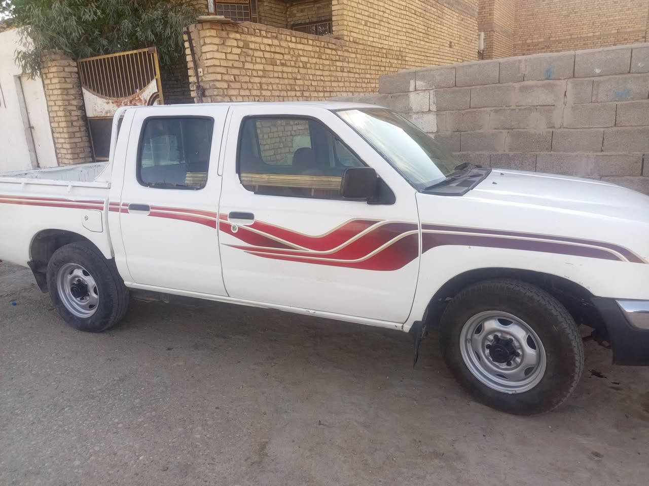 نيسان بيكم • ٢٠٠٣ • رقم ميسان