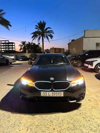 BMW e330 2021 لون اسود بغداد بأسمي  1/1 فول للاخير فتحة سقف رادارات ام...