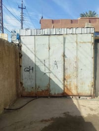 حديد • باب دفتري • متوفر