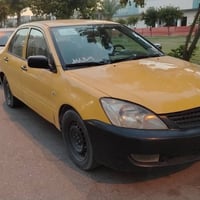 لانسر • 2010 • كالار