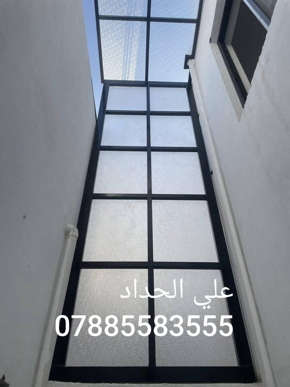 السلام عليكم احبتي 
حداد وشغلنه بضمان ان شاء الله 
اي مسقف اي عمل حديد جاهزين وبشغل هندسي ***********
***********

نص مكتوب في الصور:
- علي الحداد ***********