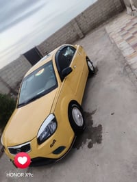 كيا ريو • ٢٠١١ • فول مواصفات