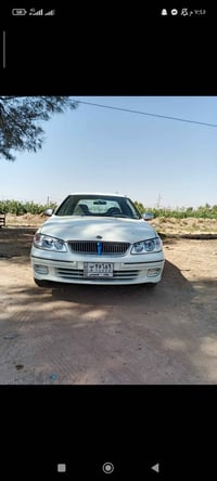 صني ٢٠٠٣ • محرك ١٨٠٠ • رقم بغداد ٢٠٣١