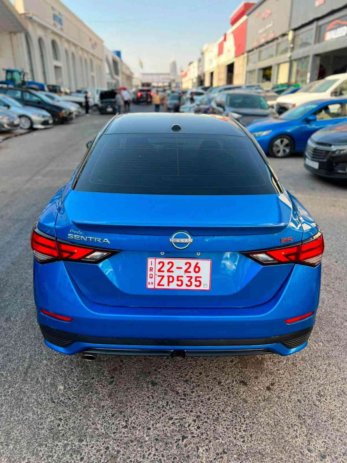 نيسان سنترا SR 2025 ماشية ١٨ 
سقف اسود بلاد فول مواصفات كشن هيتر لايت زينون سقف اسود ويل كروم ١٨ بصمة رادارت حساسات كير محرك تبريد كلها شرط كاتي تترقم اربيل سليمانية بيها تبديل باب بلاد نفس اللون وباب جملغ امامي صبغ مع حافة بونيد بجم خلفي كبس راديترات لايتات بلاد شرط الفحص مكان سيارة كركوك شراي اتصل واتس اب موجود *********** كركوك, العراق

نص مكتوب في الصور:
- ***********
- ***********