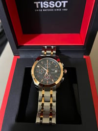 TISSOT 1853 • كرونوغراف • فضي ذهبي