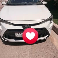 كورلا 2025 هايبرد شكل الامريكي  فول موصفات /  داخل احمر كشن كهرباء  رق...