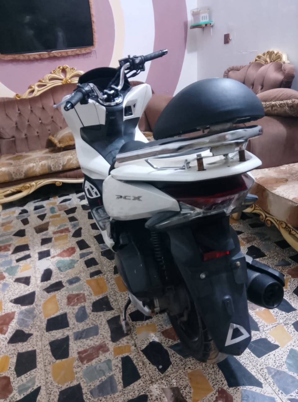 سلام عليكم دراجة بي سي إكس جيل ثالث ماشية 17حقيقي بيه بس كلج خلفي/***********
