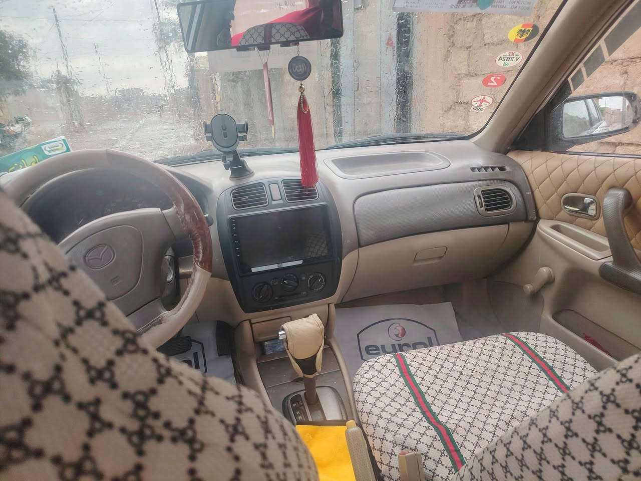 مازدا ٣٢٣ • ٢٠٠٤ • طخم جديد