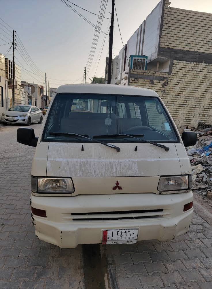 باص ١١ راكب • ٢٠٠٢ • رقم النجف