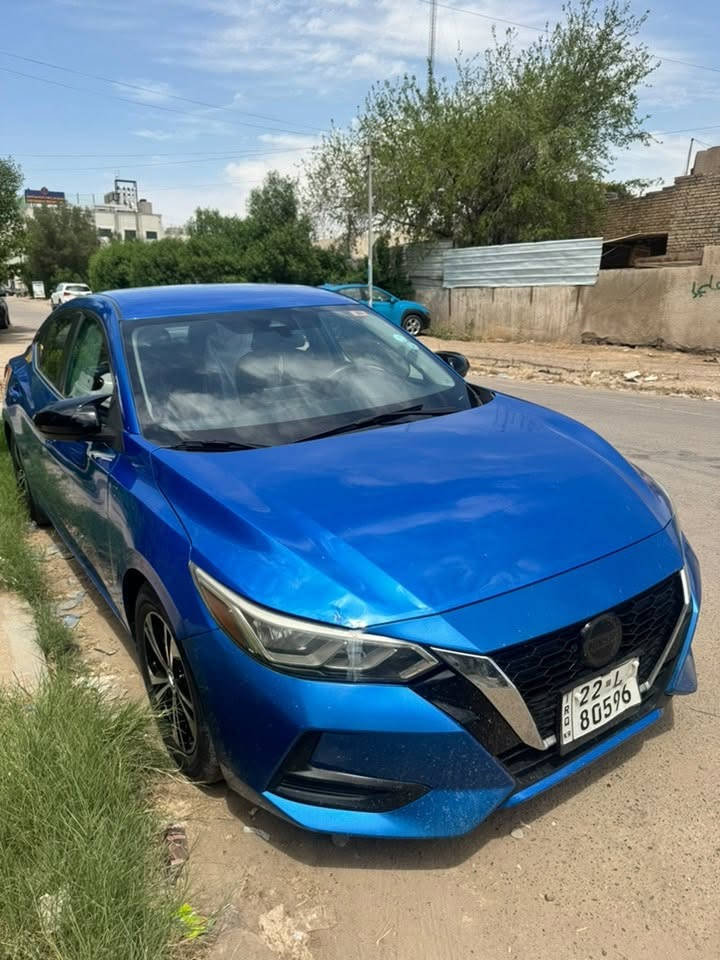 نيسان سنترا 2022 SV وارد امريكي
محرك 2000
ماشية 26 الف ميل 
رقم اربيل 
ضررها بسيط موجود بالصور 
وبالعراق خشم البنيد والهلال مال تاير الباب الخلفي جهة السايق بسيط وبدون دواخل 
مواصفات:
كشنات وستيرن تدفئه 
كاميرا وحساسات خلفية
رادارات امامي خلفي جانبي 360
تنبيه خروج عن المسار
ستيرن فول تحكم
تشغيل لايت عالي تلقائي بالضلام
٣ وضعيات قيادة ايكو ونورمال وسبورت 
شاشة اعطال
بصمة دخول وتشغيل وابواب 
شاشة كار بلي واندرويد اوتو 
عالي ناصي LED
السيارة جاهزة من كل نقص 

السعر 123 وبيها مجال بسيط 
المكان بغداد 
التواصل واتس اب ***********
