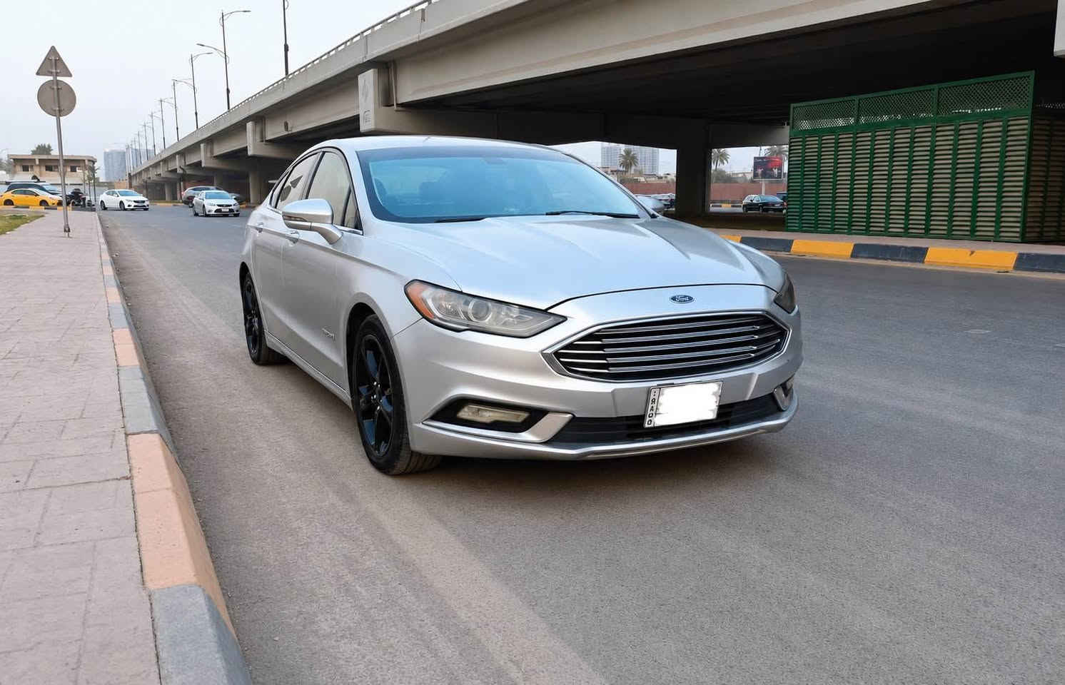 السلام عليكم .. فورد فيوجن هايبرد موديل 2018 رقم بغداد محرك 2000 تنفس طبيعي محرك وكير وبطارية مكفولات ترايك وين ما تحب والامريكي معروف  
التبريد ثلج 
منضومة زنون عالي ناصي 
بصمه تشغيل
شاشه اندرويد 
تحكم استيرن جهتين 
اشاير بالمري 
السيارة فول مراصفات عدا الفتحه
صدر وتخم تاير نظيف
وارد امريكي حادثها جهة اليسار تبديل 4 قطع نفس اللون بلادي بدون دواخل شواصي لغود مكفولات
وصبغ وجاملغ خلفي فقط 
صارت بيها ضربه بسيطه بالجديد بعدها ما مصلحه 
بيع او مراوس بمكينه جبيره . جالنجر كمارو شعندك راسلني واتساب *********** حلة, بابل
