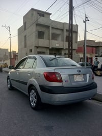 كيا ريو 2009 وارد امريكي كلها كواد واحد السياره فقط البوند صبغ  رقم بغ...
