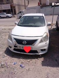 للبيع نيسان فيرسا موديل2014 رقم بغداد بأسمي وارد امريكي حادثها جاملغ و...