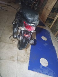 PCX • ١٢٥ • جيل أول