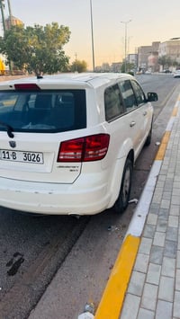 🚘 للبيع | دودج جورني 2009 🚘 ✅ الموديل: 2009  ✅ اللون: أبيض  ✅ رقم: بغد...
