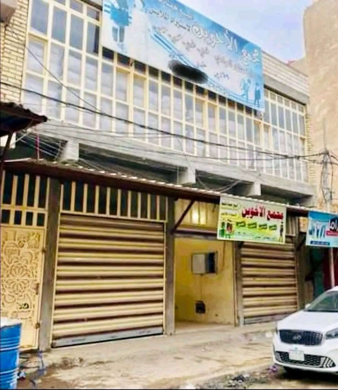النجف • ٢٧٣م • بناية طابقين