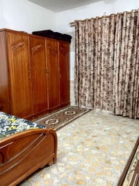 حي الفرات • ١٠٠م • واجهة ٤ ونص