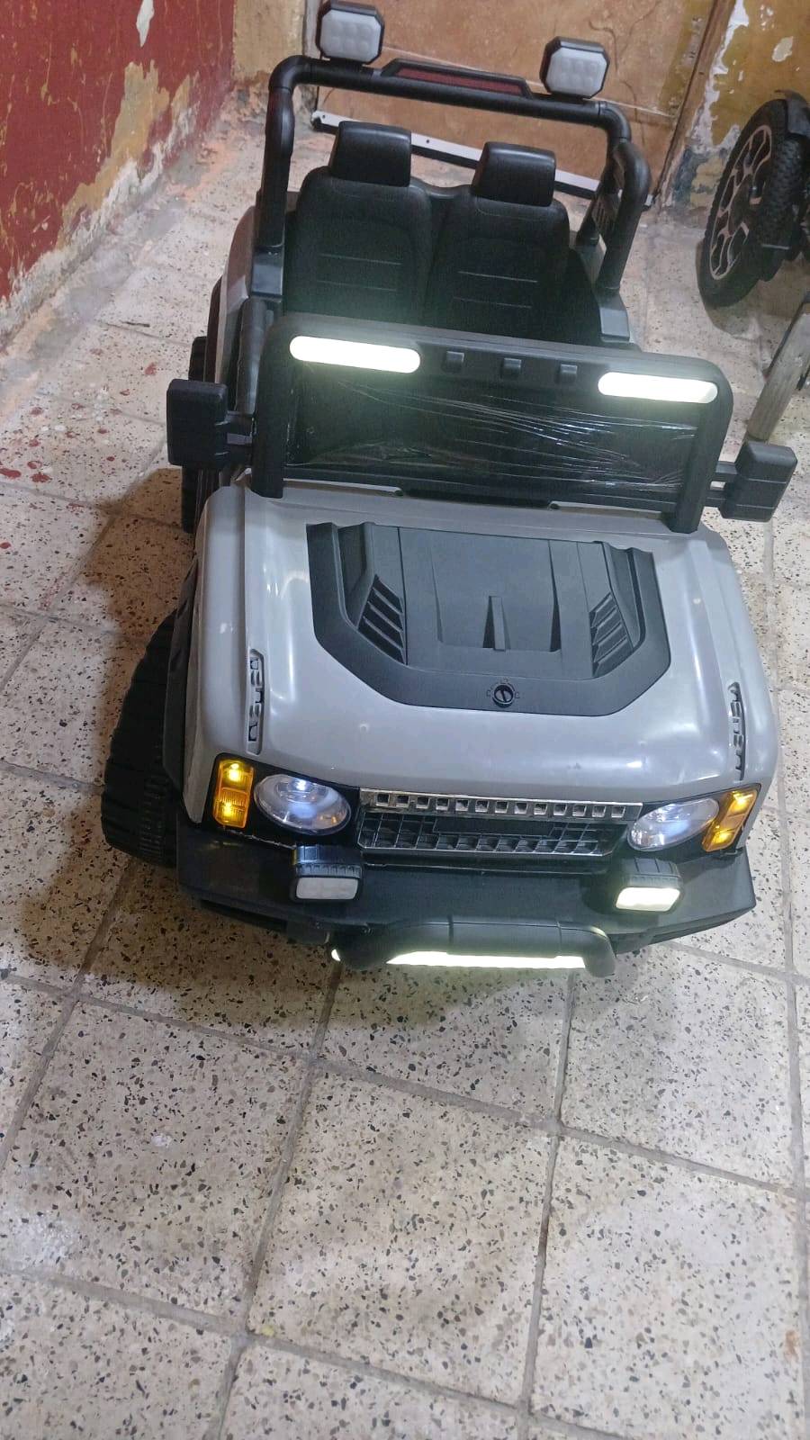 سيارة اطفال ريمونت تحكم وشاحن كلشي شغال بيه السعر ١٢٠ الف  وبيه مجال الرقم ***********