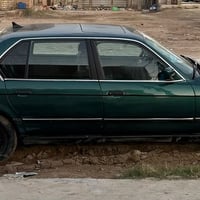 بي ام 735iL • زيتوني • انبار انگليزي