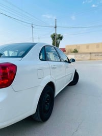 اوبترا ٢٠١٣ • ماشي ٩٠الف • مكفولة