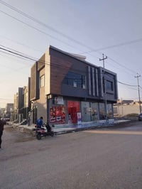 عمارة تجارية • مؤجرة بالكامل • ٣٠٠م