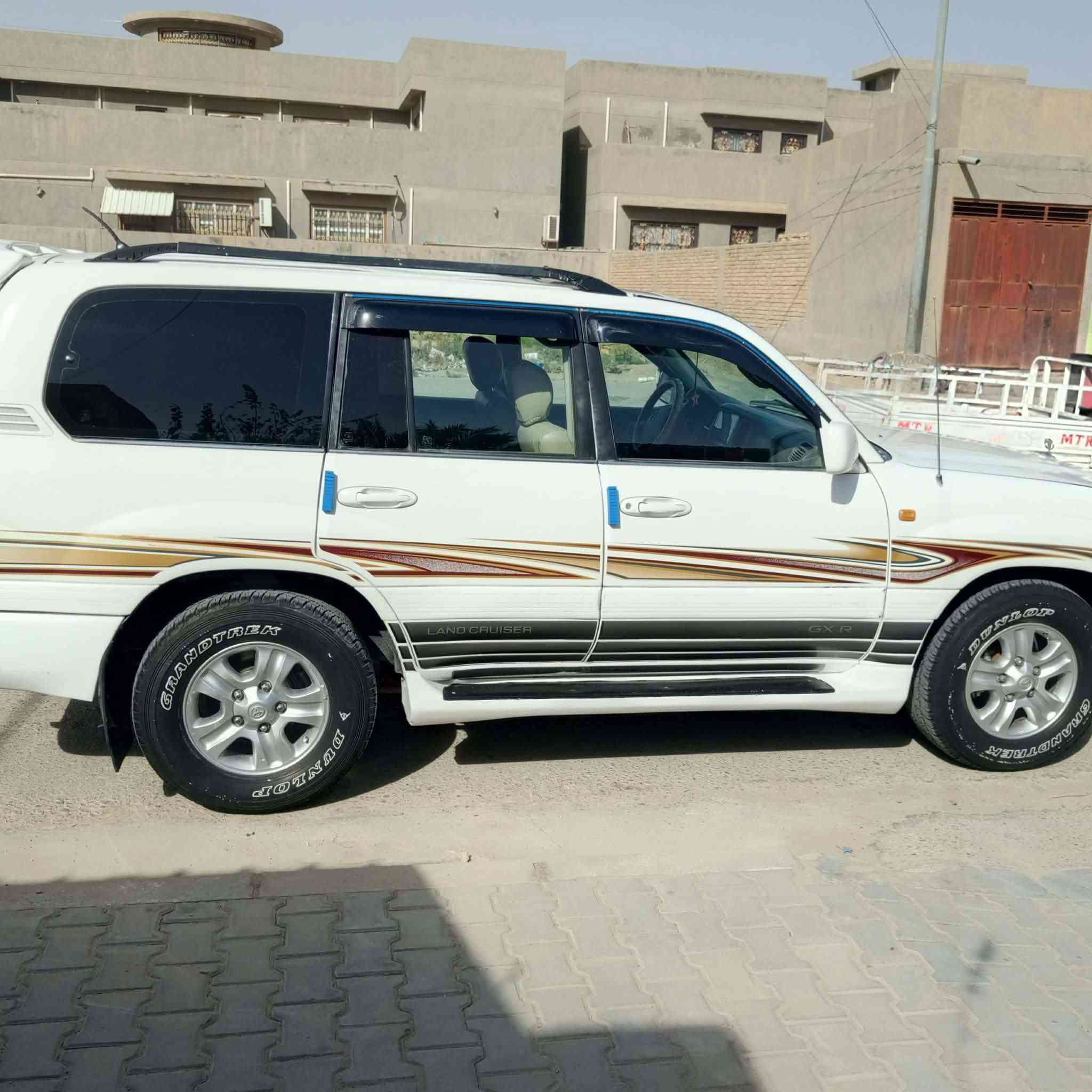 سياره لاندكروز 2004مكفوله فول مواصفات تبريد 3قطع لوكير شغال فتحه سقف تخم تاير جديد رقم بغداد مشروع وطني ستفسار عل رقم ***********
