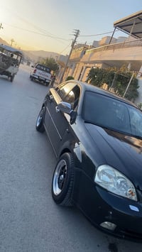 أوبترا 2005 • جير عادي • كهرباء كاملة