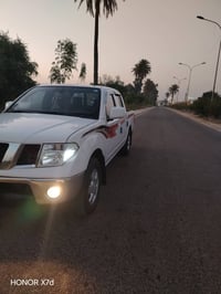 نيسان نافارا • ٢٠١٠ • رقم مميز