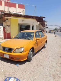 جيلي CK • ٢٠١٣ • مكينة كورلا