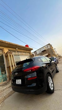 توسان 19 للبيع  فقط امريكي حادث خفيف بدون شاصي وبدون لغد  رقم بغداد قط...