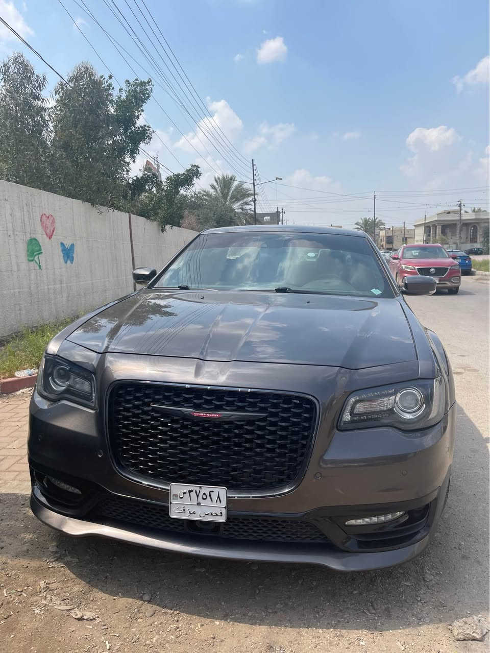 كرايسلر S300 2021
 دبل دعامية 
السيارة فول مواصفات ١/١
محرك v6 3600
السيارة جديدة بكل معنى الكلمة بحالة الوكالة من كلشي ماشية مشي امريكا 119 الف انتبه امريكا  وهنا ماشية الفين 
رقم بغداد 
مواصفات /
1- تشغيل عن بعد + وياها بصمتين
2- كامره خلفي دوارة
3- حساسات امامية + حساسات خلفي
4- اشاير جانبي 
5- دمام خلفي بيتس + سماعات في جميع الابواب 
6- بانوراما 
7- رادار امامي + رادار خلفي + رادار جانبي 
8- كشن جلد + كشنات كهرباء + كشنات تبريد وتدفئة 
9- استيرن كهرباء + تدفئة 
10- شفتات بالستيرن
11- لايت زينون امامي + لايت داينمك متحرك مع الستيرن 
12- تدفئة كشنات خلفية
13- بردة كهرباء خلفية 
14- خزن ميموري كشن السائق + الستيرن كهرباء
15- تحديد مسار + قيادة ذاتية + توقف ذاتي 
ماكو مواصفات بالاوباما مموجودة بالسيارة شنو يخطر على بالك موجود 
السيارة تم تبديل الباب نفس اللون وصبغ على كد الحادث شبرين فقط جميع الايرباكات سليمة 
السيارة تجي تشوفها وتراي وين متريد الصدر الامامي والخلفي كلة جديد 100‎%‎ شرط كلة اصلي وكالة السيارة مال جناي الله شاهد عليه السعر 280 ورقة وبيها مجال للاستفسار *********** بغداد, العراق
