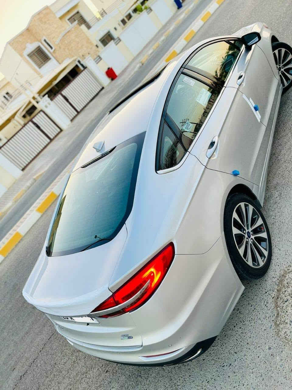 السلام عليكم…الحلال للبيع
 بسعر 109$ورقه اعتذر عن الاقساط 
فورد فيوجن 2019 SE ايكو بوست امريكي فووول 1/1
 لون رصاصي سلڤري مميز جداً  
كير اوتوماتيك  بوصله بدون عيب
محرك 2000 تنفس طبيعي 4سلندر المرغوب بدون فتح بدون عيب (يعني مو تيربو )
❇️مواصفات فوول 1/1 للاخير❇️
بصمه تشغيل وابواب وصندوق
فتحه سقف زجاج 
رادار امامي وكامره 
رادار جانبي 
نظام سبورت S 
دبل كزوز 
شفتات ستيرن كير رياضي
داخل اسود ملكي جلد
كشن السايق والراكب كهرباء 
قطعتين تبريد
شاشه كار بلي حجم كبير وكامره دواره
كروس سرعه
تحكم ستيرن 
عداد ديجتل ودبل شاشه عرض اعطال
بلوجكترات 
حساسات خلفيه
بك لايت ليد
لايت عدسه زينون بلادي 
ويل كب 18 كروم بلادي
تبريد ثلج 
وبعد بيها هوايه مواصفات …. 

🔴سياره جاهزه من كلشي تشغل وتطلع 
السياره بيها صبغ جاملغ السكن  ونص الباب ملاون كلير فقط بدون اي دواخل بدون تبديل شرط السونار

رقم 25 انكليزي الجديد / تحويل بنفس اليوم 
السعر 109$ ورقه وبيها مجال بسيط
🔺مكاني تكريت القادسيه
***********
***********
