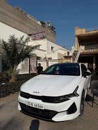 K5 موديل 2022 بانوراما كشنات احمر امريكي مكينة 1.6 تيربو  ماشية 30 الف...