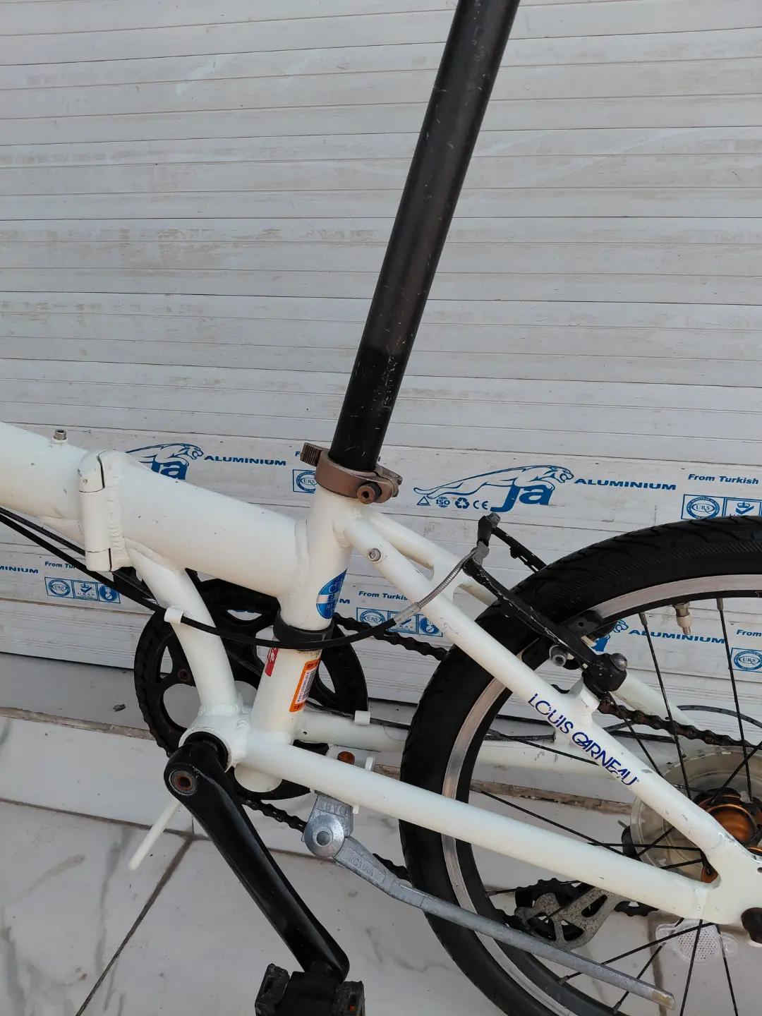LOUIS GARNEAU FOLDING BIKE حجم 20 المنيوم بالكامل    ✈يوجد توصيل لجميع المحافضات ✈ كركوك مدخل سايدين حي الاسرى والمفقودين  معرض ابو شيفان ( *********** )
