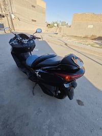 دراجه مكينه مكفوله فول بانزين وطلع وين متريد مراوس بطح باندا شرط نضيفه...