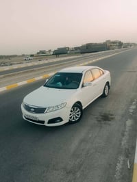 كيا اوبتيما • ٢٠٠٩ • مكينة ٢٠٠٠