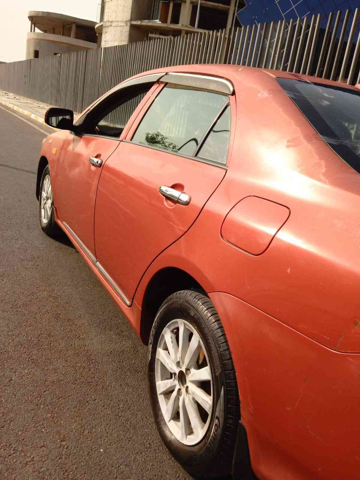 السلام عليكم 
تيوتا كورلا 

موديل 2009

أمريكي سونار موجود بل صور 

محرك 1800

سياره جديده بمعنى الكلمة 

سعر 85ورقه المكان بغداد الحريه 

رقم *********** بغداد, العراق

نص مكتوب في الصور:
- كار تشيك الكشف عن الصبغ السمكرة البارد التبديل الخدوش الدقوش المطعوج المعلومات الكهربائية *********** *********** العنوان : بغداد - الديوان - تقاطع دروويش - مقابل المجمع السكني تاريخ الفحص 22-09-2026 الوقت PM 8:29:06 ملاحظة : الفحص نافذ لمدة 3 ايام من تاريخ الفحص رقم السيارة 11 Q53303 اسم صاحب السيارة حيدر جاسم النوع والموديل تويوتا كورولا/احمر 2009 الجانب الأيمن صبغ ومفتوح وجامع امامي - صبغ باب امامي - بارد وقطعة باب خلفي - ضررد جامع خلفي - تكمة غير مفتوحة الجانب الأيسر صبغ ومفتوح وجامع امامي - صبغ باب امامي - صبغ باب خلفي - طقة جامع خلفي - تكمة غير مفتوحة - رصعات وخدوش في الجانب الجزء العلوي صبغ بند - تبديل غير لون دعامية المصد الأمامي المصد الخلفي رصعات وخدوش فية البنطة - ضرر ومقلوعه دعامية
