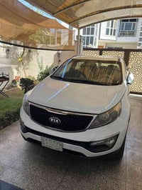 سبورتج موديل ٢٠١٦  ماشيه تقريبا ١٣٥ الف كيلو  محرك GDI  رقم بغداد  سيا...