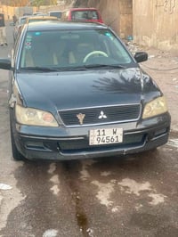 لانسر 2003 • مكينة 2000 • رقم بغداد