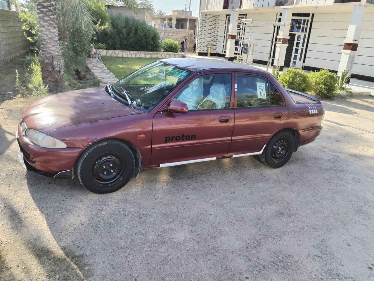 بروتون موديل 2002 كير عادي سياره نضيفه ماناقصه شي  مكانه الرمادي تبريد ثلج شراي يراسلني ***********
